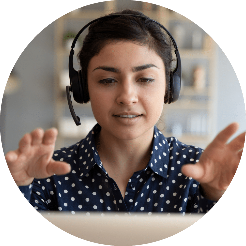 Woman wearing a headset in mid-conversation