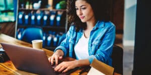Freelancer woman working on her laptop