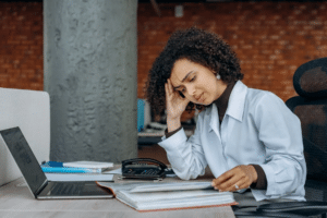 woman reviewing ledgers